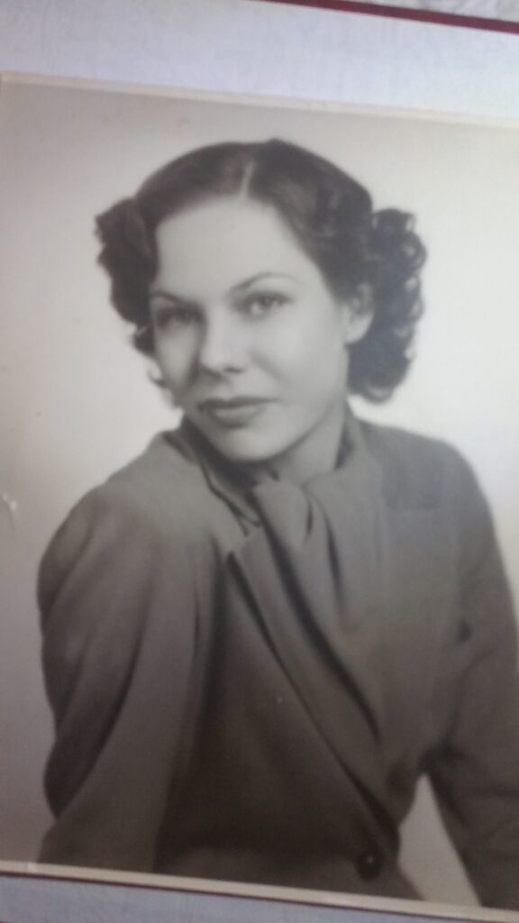 Vintage black-and-white portrait of woman in blouse