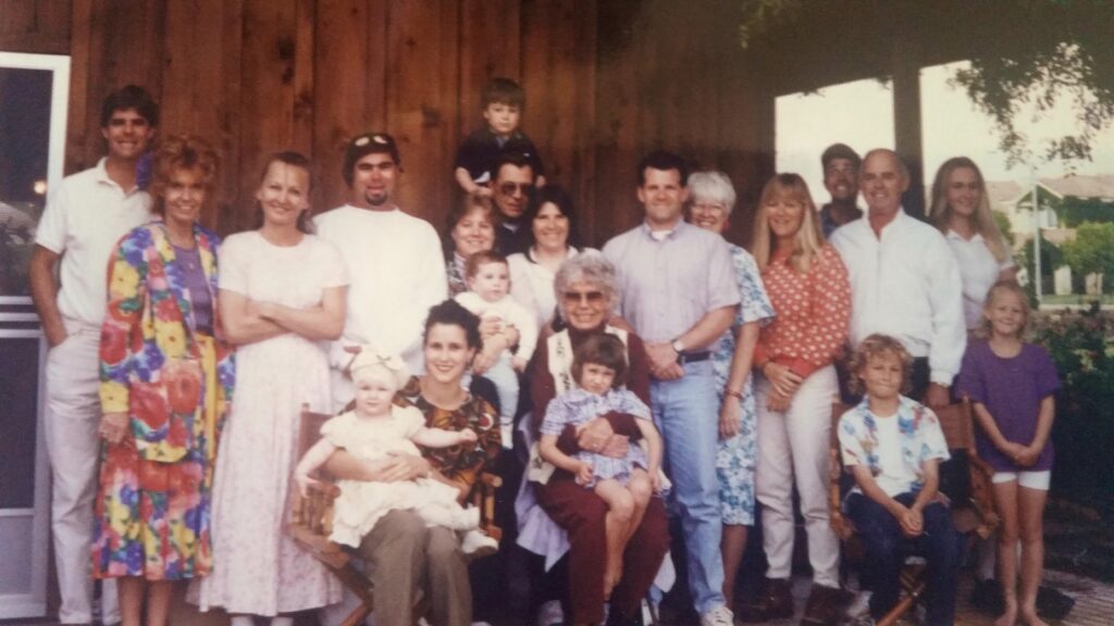 Large multigenerational family portrait outdoors